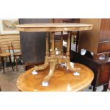 Two Victorian walnut and inlaid tilt top loo tables,