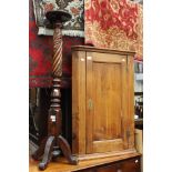 A 19th Century pine hanging corner cupboard,