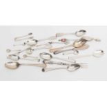 A collection of silver items to include tea spoons, sugar nips,