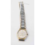 A ladies Yves St Laurent steel bi colour bracelet watch