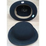 A pair of Bowler hats.