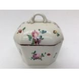 A porcelain trinket pot and cover. Hand painted floral decoration.