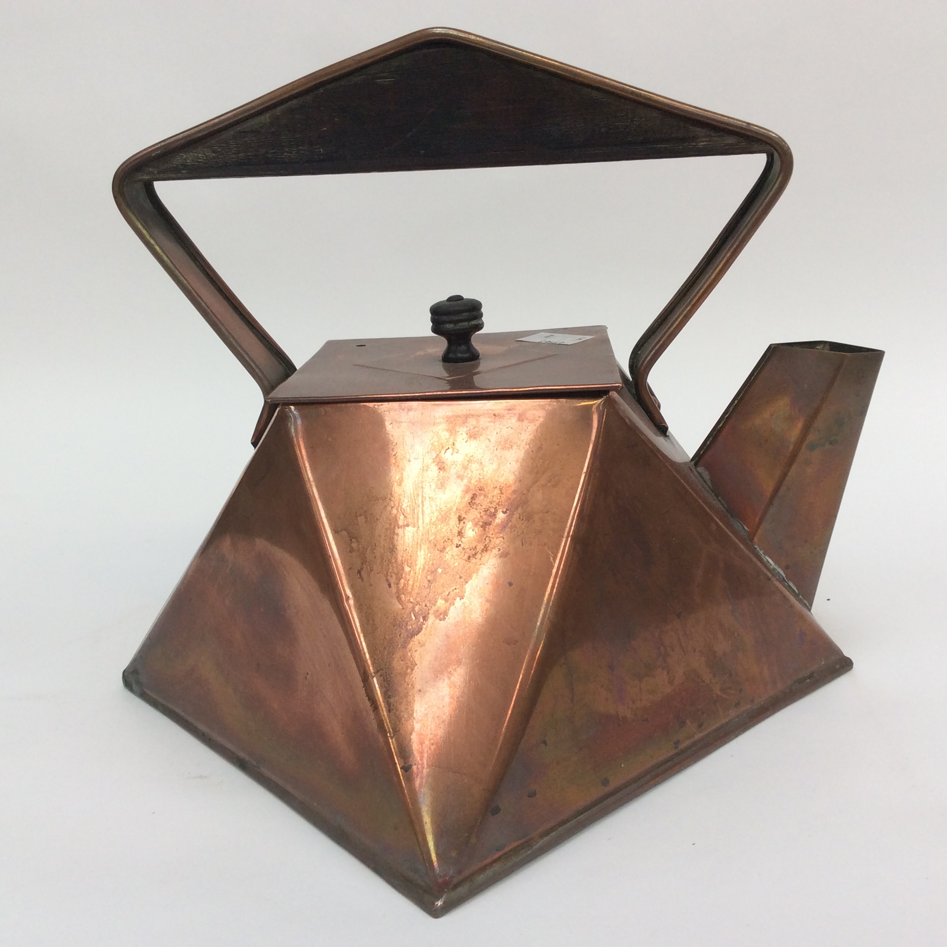 An early 20th Century Cubics copper kettle in the style of Dresser