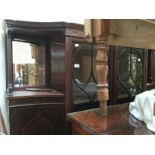 An Edwardian mahogany break front display cabinet,