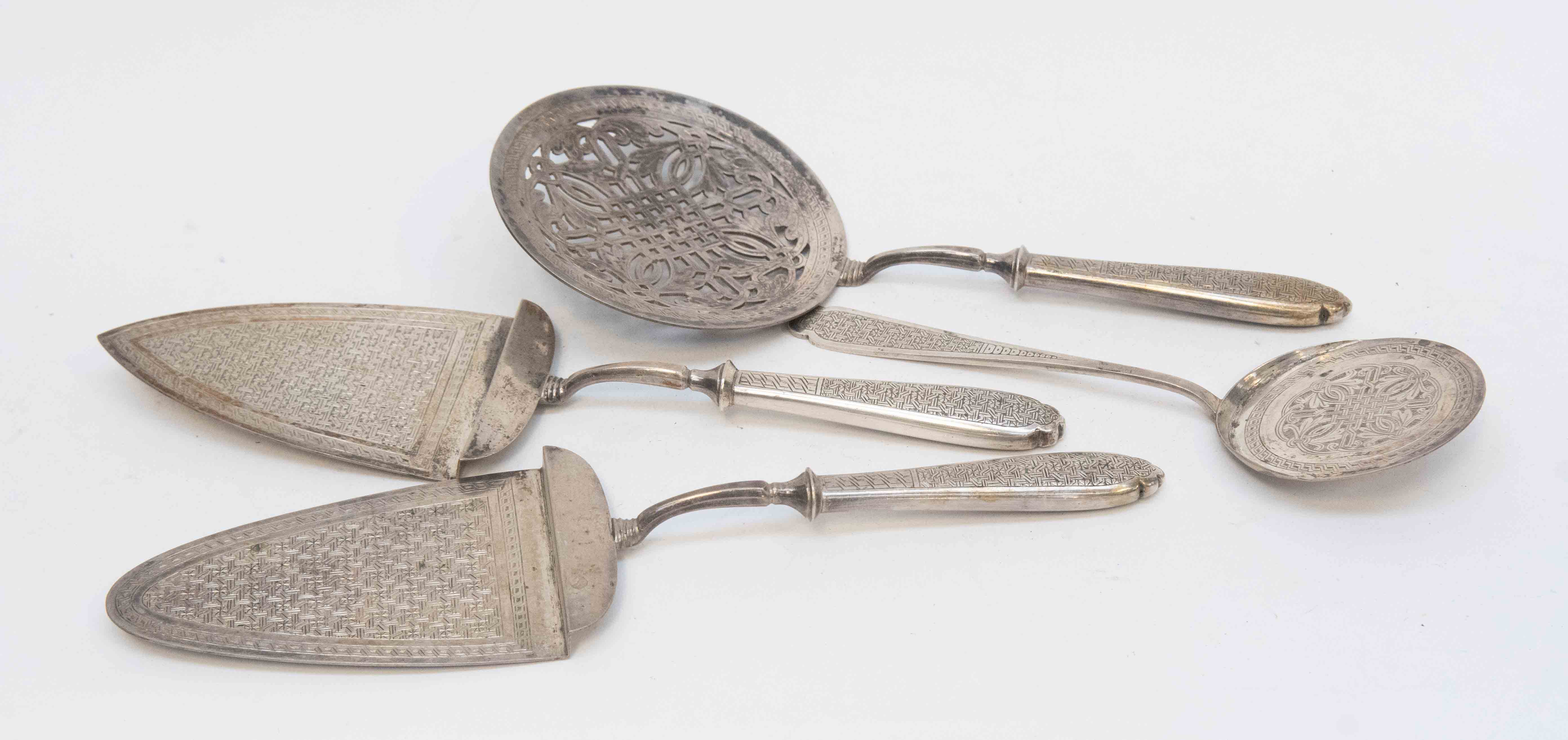 4 islamic silver plated food servers ornately chased engraved with engraved handles