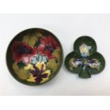 A Moorcroft green ground ' Anemone' pattern footed bowl, approx 7cm high, together with a Moorcroft,