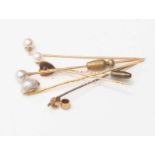 Six mixed 9ct, 15ct gold and yellow metal pearl and semi precious stick pins,