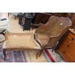 A late 19th Century walnut canework wing back armchair, probably French,