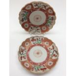 A pair of Chinese saucers with iron red decoration,