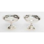 A mathed pair of silver of circular raised bon-bon dishes/tazze, Birmingham,