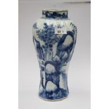 A Chinese blue and white vase of shaped baluster form, Kangxi, restoration,