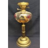 A late Victorian glass and metal base oil lamp