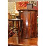 A 19th Century mahogany bow fronted hanging corner cupboard, 105cm high,