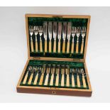 A wooden cased set of twenty four silver plated fish knives and forks