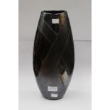 A Poole pottery tall, oval shaped vase, in black with lustre glaze,