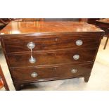 A George III mahogany chest of drawers, fitted with three long graduated drawers,