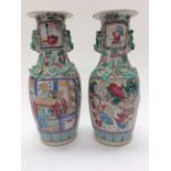 A pair of Canton famille rose vases, circa 1880,