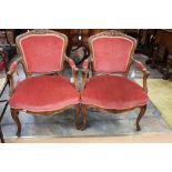 ***TO BE SOLD BY PRIVATE TREATY***A pair of French Louis XVI style walnut chairs with carved rails