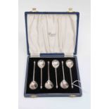 A collection of six boxed coffee spoons with fir cone finial retailed by Harrods, London 2008, 72.