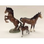 Beswick mare and a foal, bay,