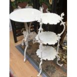 A late 19th Century white painted cast iron three tier stand,