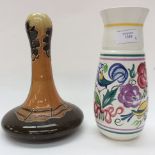 A Poole Pottery cream ground vase, hand painted,