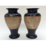 A pair of Royal Doulton vases