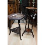 An early 20th Century oak two-tier plant stand, together with a two-tier hexagonal occasional table,