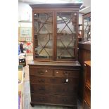 A George III and later oak bookcase on chest, 200cm high, 97cm wide,