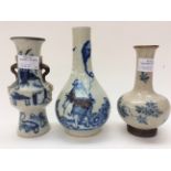 Three Chinese blue and white vases, one with applied prunus decoration,