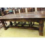 A 17th Century style oak long table, joined construction, 76cm high, 280cm wide, 79cm deep.