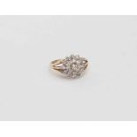 A diamond cluster ring set in 9ct gold, size H 1/2,