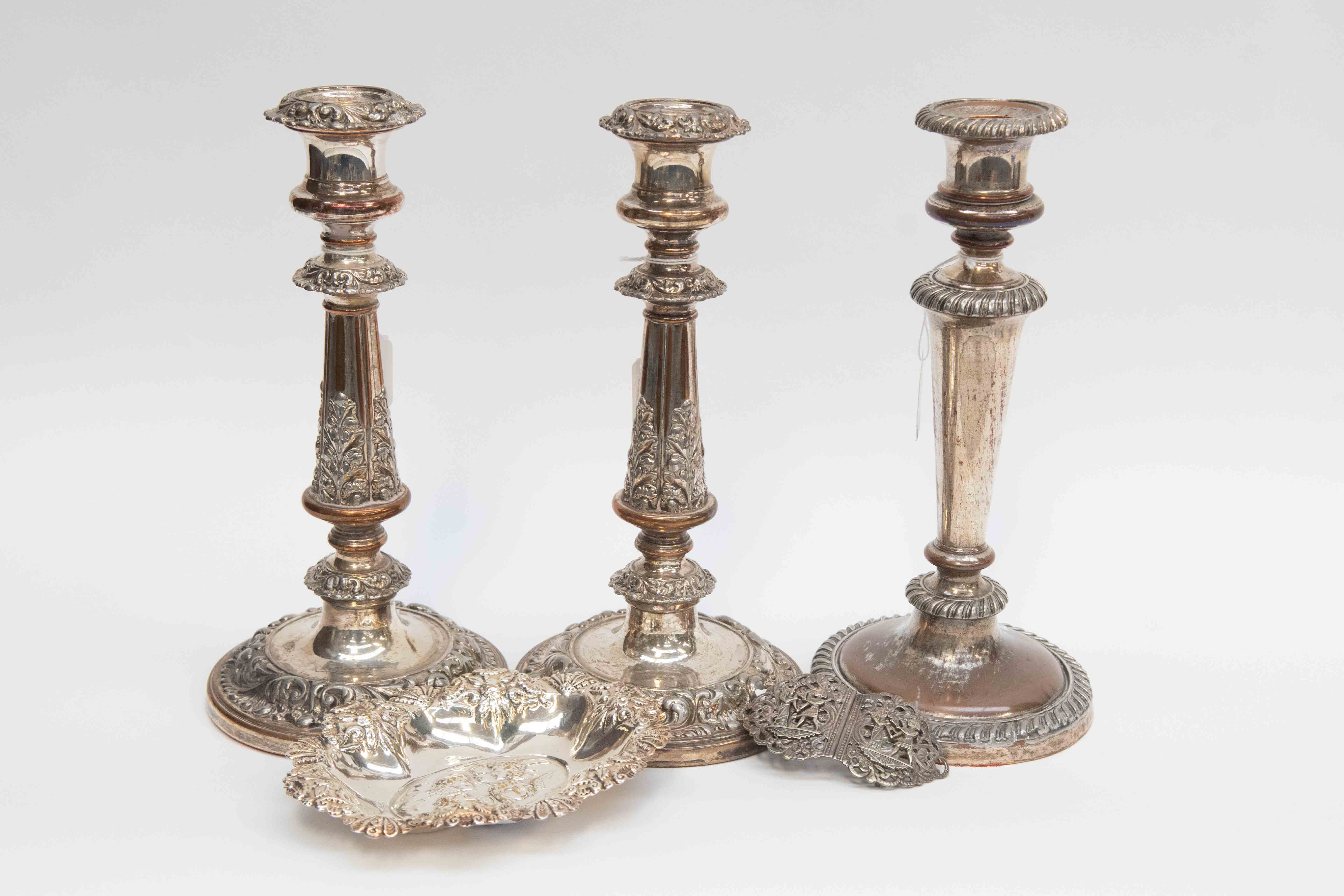 Early 20th century silver plated candle sticks along with another plated Victorian pin dish and