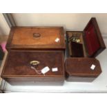 Four Georgian inlaid mahogany tea caddy's