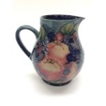 A Moorcroft 'Finches and Berries' pattern jug,