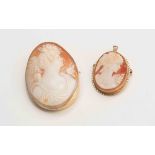 15ct marked large shell cameo brooch of a female shoulder height scene in profile,