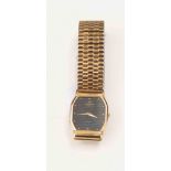 A Raymond Weil 18k gold plated watch,