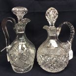 Two cut glass decanters and stoppers,
