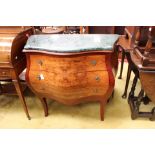 A French style marble topped commode, of Bombe form,