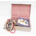 A velvet jewellery box containing costume brooches, enamel gilt metal and paste set various,