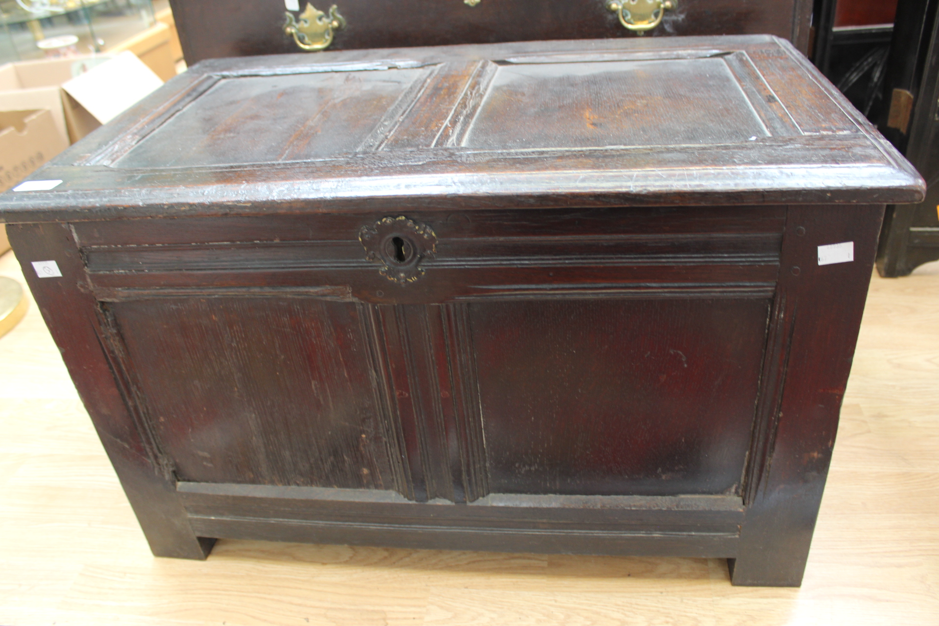 A 17th Century and later oak coffer, altered considerably, 47cm high, 78cm wide,