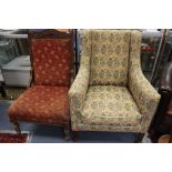 An Edwardian upholstered tub chair, raised on square legs,