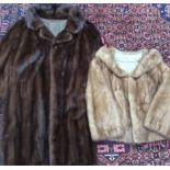 A black sable mink jacket, patterned lining, along with a dark mink 3/4 jacket,