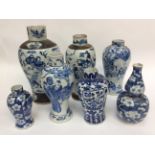 Two 19th century Chinese blue and white Mei-ping shaped vases with blue four character marks,