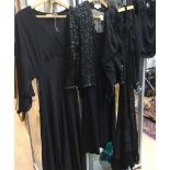 A 1930s black lace dress, cut on the bias,