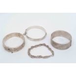 Silver jewellery comprising three silver hinged bangles, one with large feature hallmarks,