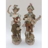 A pair of Austrian porcelain figures of a boy lute player and lady dancer Date 1900 3007/7 to