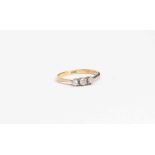 A diamond three stone, 18ct gold ring, size O, total gross weight approx 2.