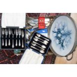 A collection of plated flatware trays and box canteen