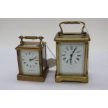Two gilt brass carriage timepieces